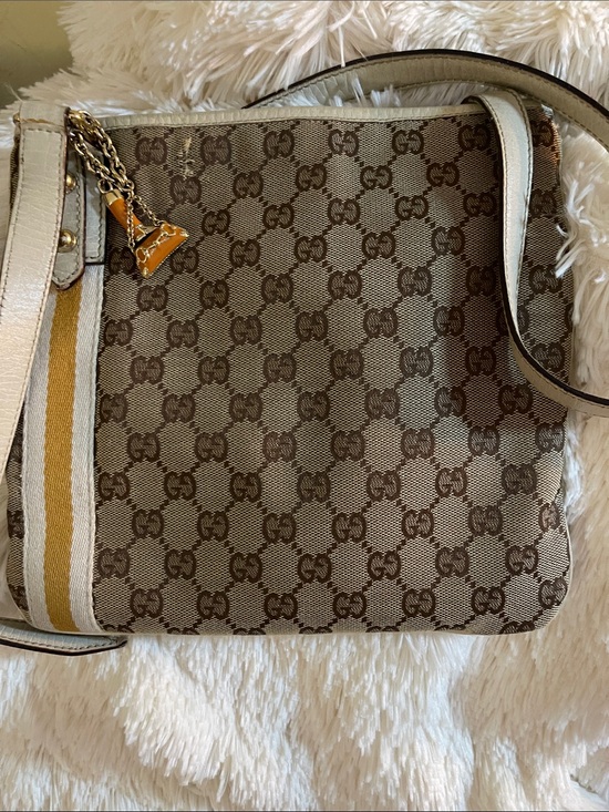 Gucci Handbags - Gucci Crossbody with COA and two bag charms